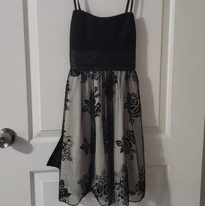 Black mini dress with lace overlay